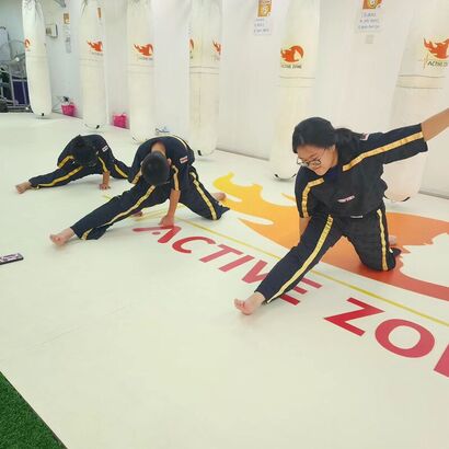 children stretching before kids martial art lesson